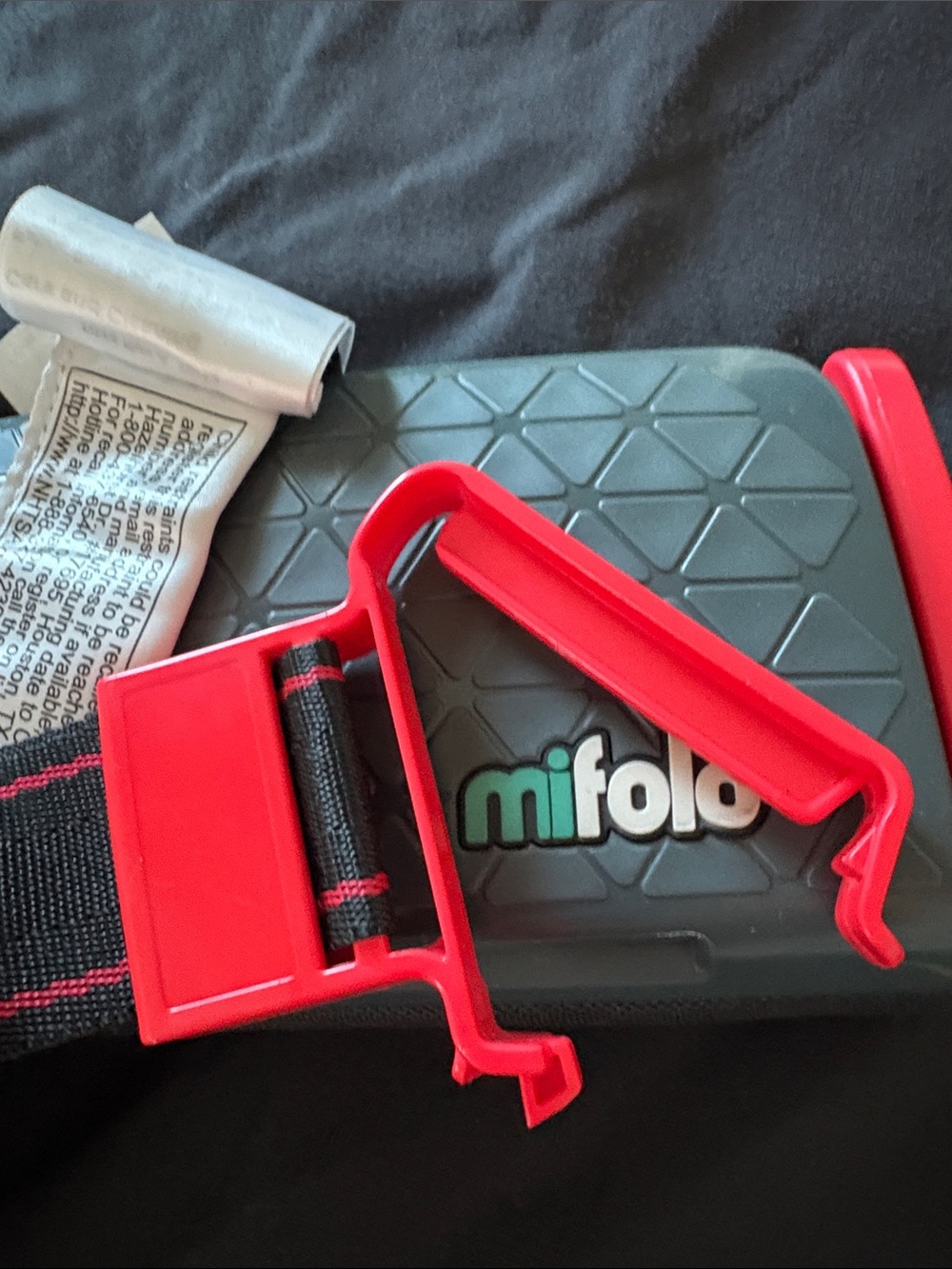 MiFold Booster Seat Compact Travel Booster in Black and Red - Picture 13 of 14